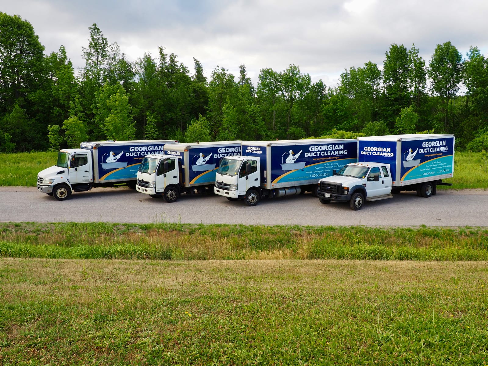 The Georgian Duct Cleaning fleet of service trucks